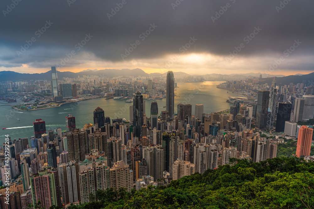 Dramatic sunrise of Hong Kong city skyline from Victoria peak, China.