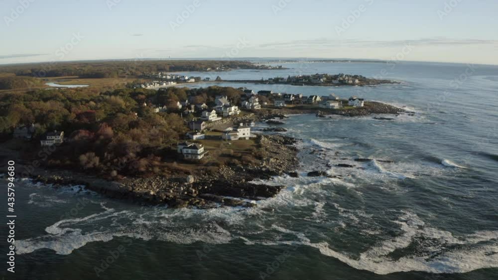 Aerial Descending Over A Small New England Coastal Community With Quaint Homes Nestled Along A Rocky And Tree-Lined Shore - Kennebunkport, Maine Aerial Descending Over A Small New England Coastal Community With Quaint Homes Nestled Along A Rocky And Tree-Lined Shore - Kennebunkport, Maine