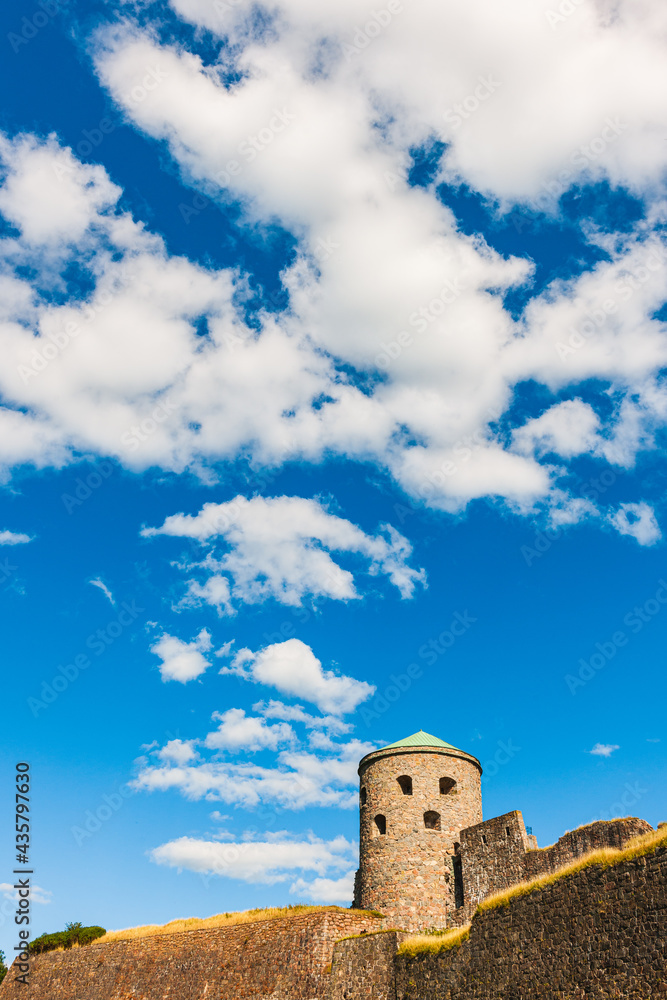 Old fortress tower against blue sky Old fortress tower against blue sky