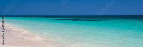 Perfect tropical beach and lagoon, panoramic summer background