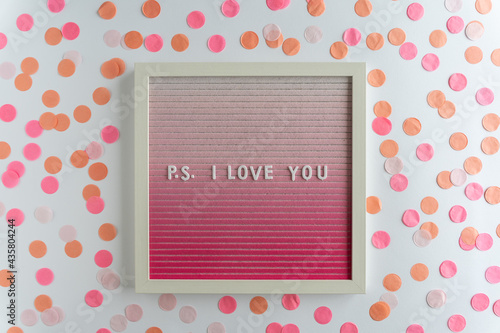 Pink Letterboard Words That Spell P.S. I Love You, on a white background, horizontal photo