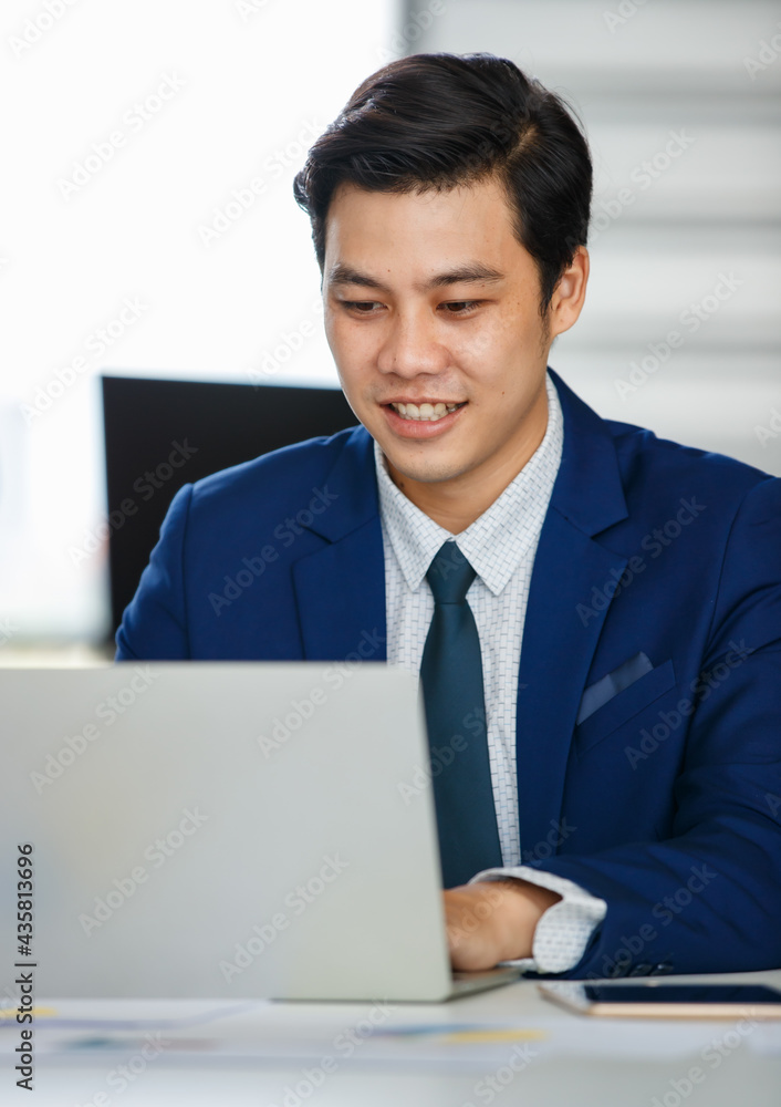 Businessmen working together in office