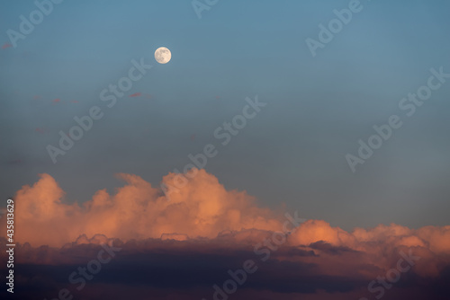 Moon with sunset sky background.
