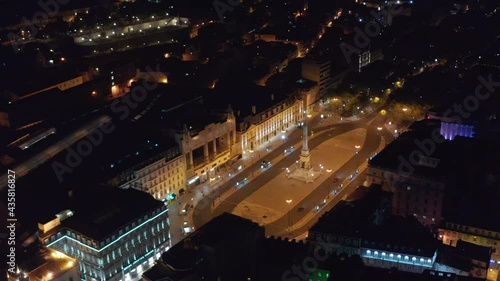 Aerial night view of Monumento aos Restauradores on public square with VIP Executive Eden Aparthotel building in Lisbon, Portugal photo