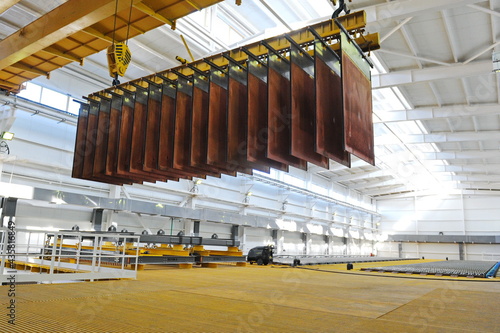 East Kazakhstan region, Kazakhstan - 12.02.2015 : Layers of cathode copper on a special lift for processing. photo