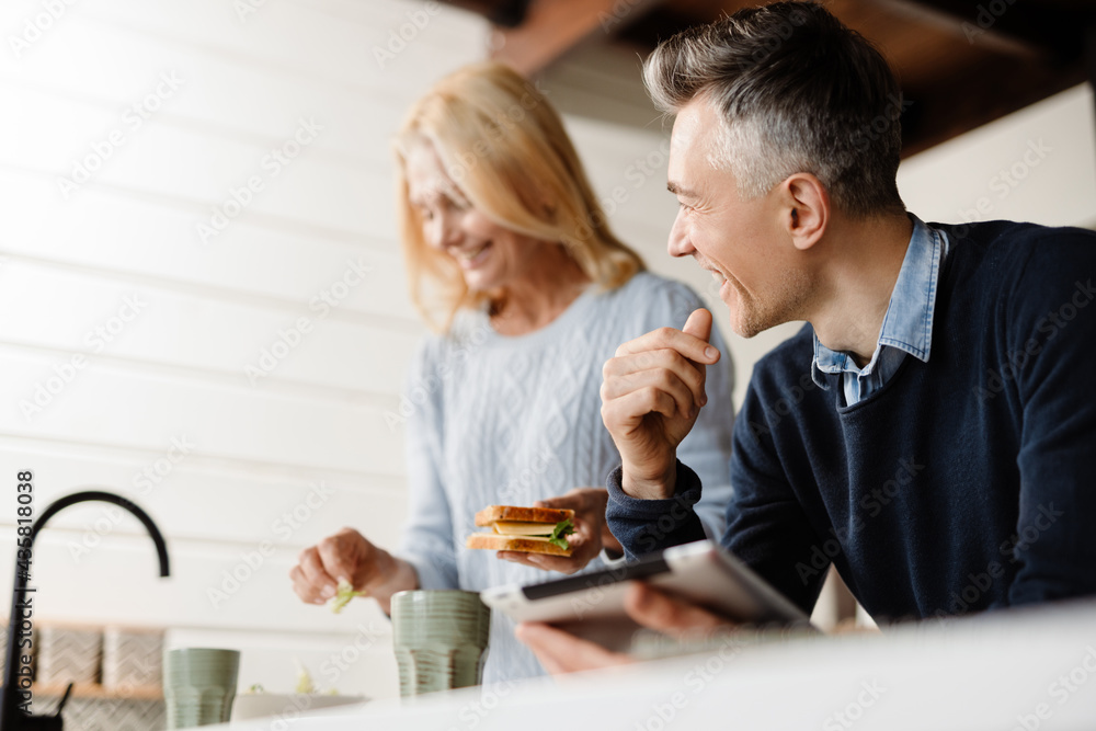 Couple wife and husband having breakfast Couple wife and husband having breakfast