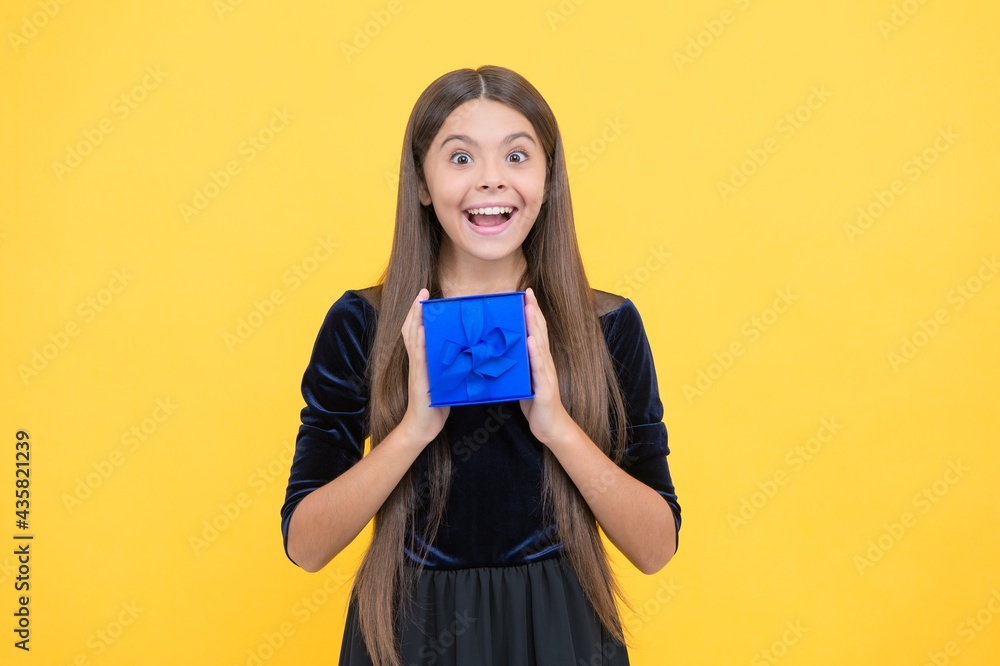 happy teen girl hold present box for birthday holiday, surprise