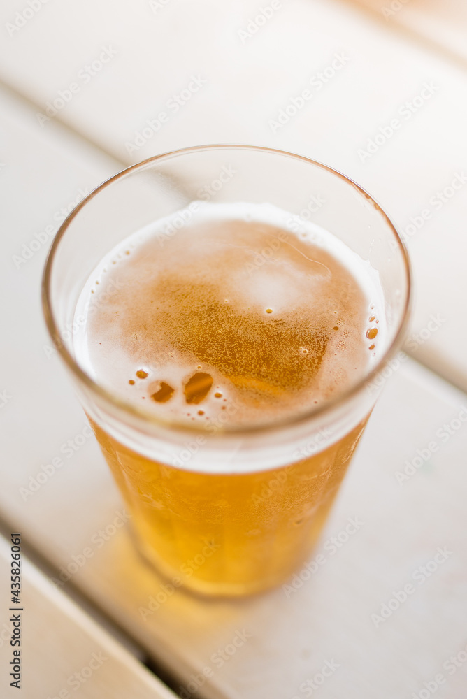 Typical Americano Glass with cold beer at a bar in Brazil Typical Americano Glass with cold beer at a bar in Brazil