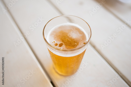 Typical Americano Glass with cold beer at a bar in Brazil