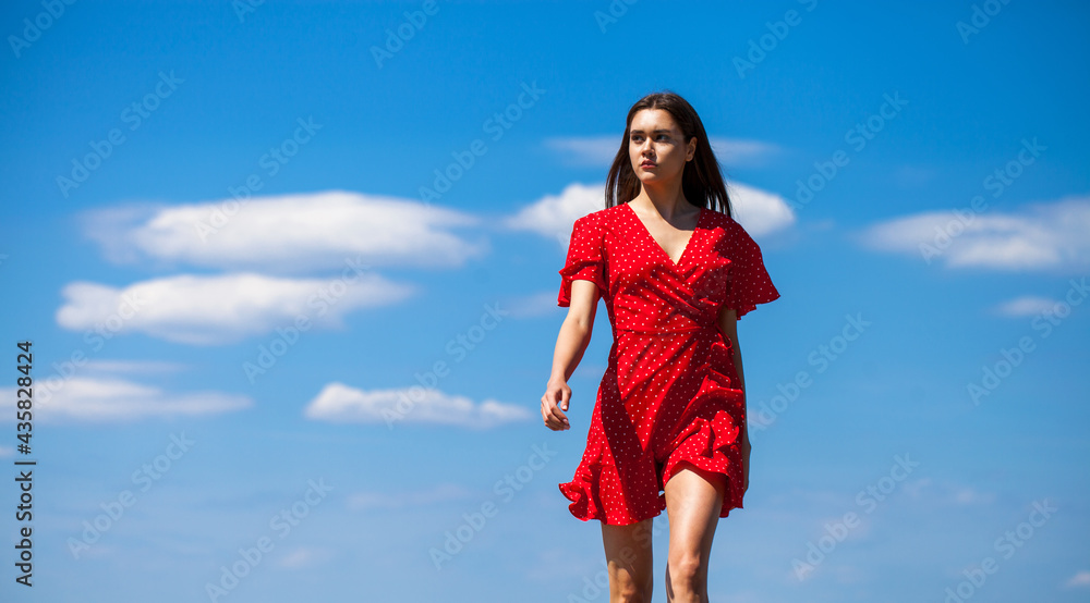 Portrait of a young beautiful woman in red dress Portrait of a young beautiful woman in red dress