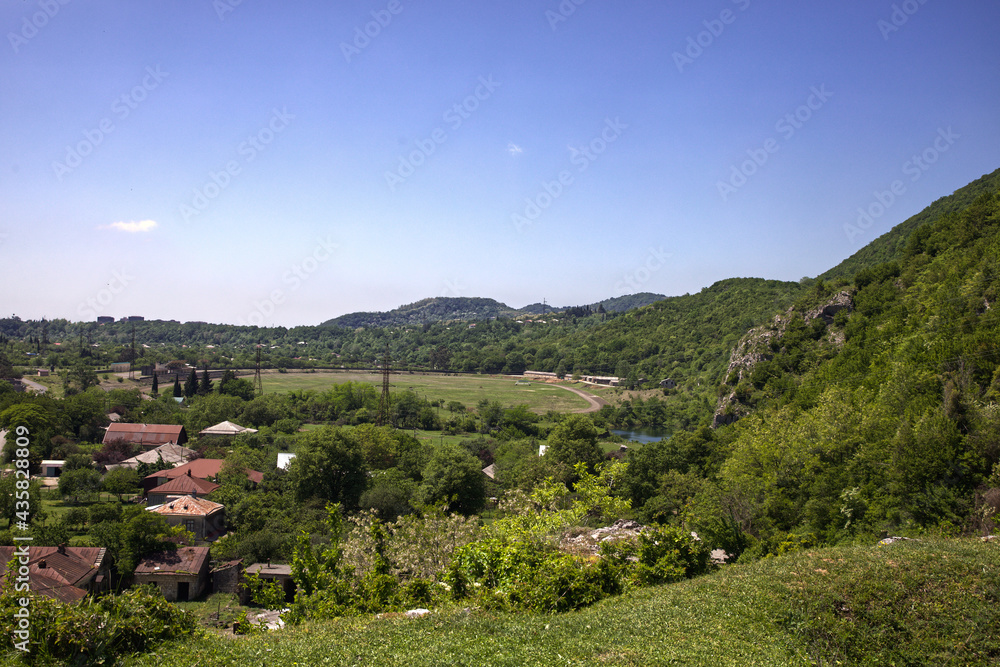 panoramic view of the sky, mountains and small town, landscape