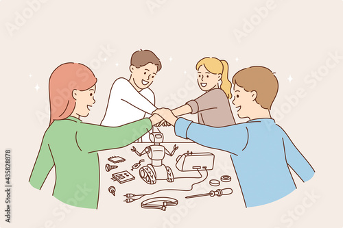 Happy children and games concept. Group of children friends cartoon characters playing together as team with robot shaking hands as union vector illustration 