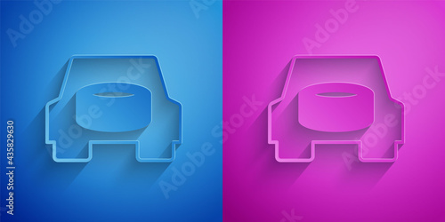Paper cut Spare wheel in the car icon isolated on blue and purple background. Process of replacing the wheel. Storage location of the spare wheel in the trunk. Paper art style. Vector