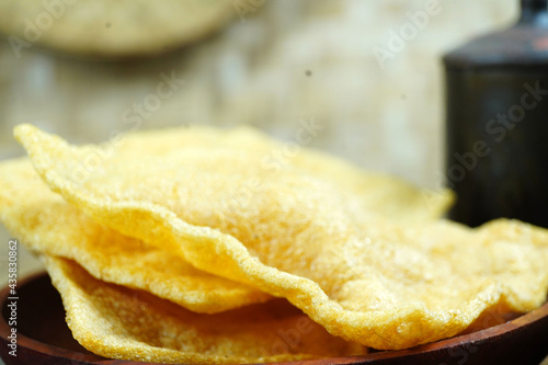 Crispy papadum (appalam or papad) Indian dish - a seasoned flatbread