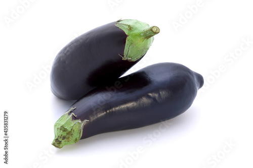 Two purple eggplants isolated on white background