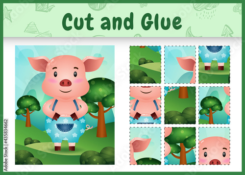 Children board game cut and glue with a cute pig using pants