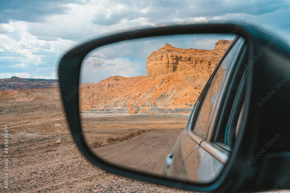 In the side mirror of the car view of Alstrom Point, USA
