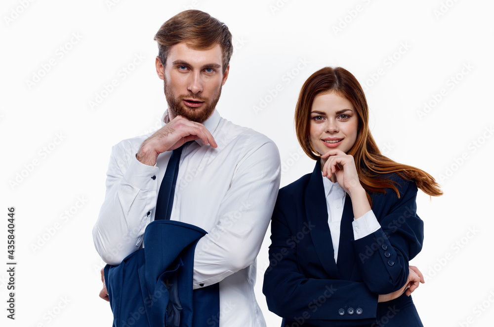 man and woman standing side by side cropped view light background man and woman standing side by side cropped view light background