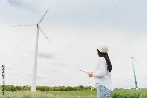 Female Engineer in a Wind Turbines Farm