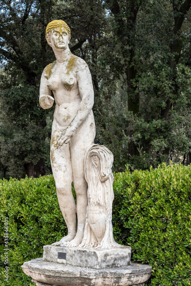 Ruined marble sculpture of a naked woman decorating a garden in Rome Ruined marble sculpture of a naked woman decorating a garden in Rome