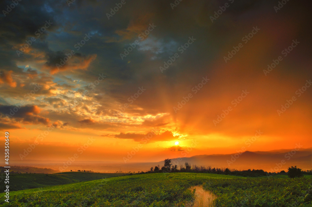 Majestic sunset in rural countryside Majestic sunset in rural countryside