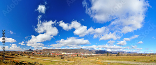 Spring landscape after rain, intense blue sky and clouds