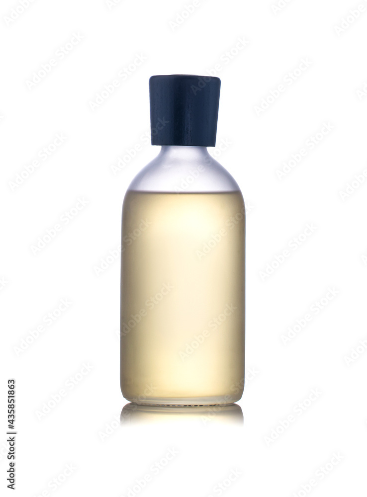 Glass bottle with home fragrance. Liquid for incense sticks isolated on white background Glass bottle with home fragrance. Liquid for incense sticks isolated on white background