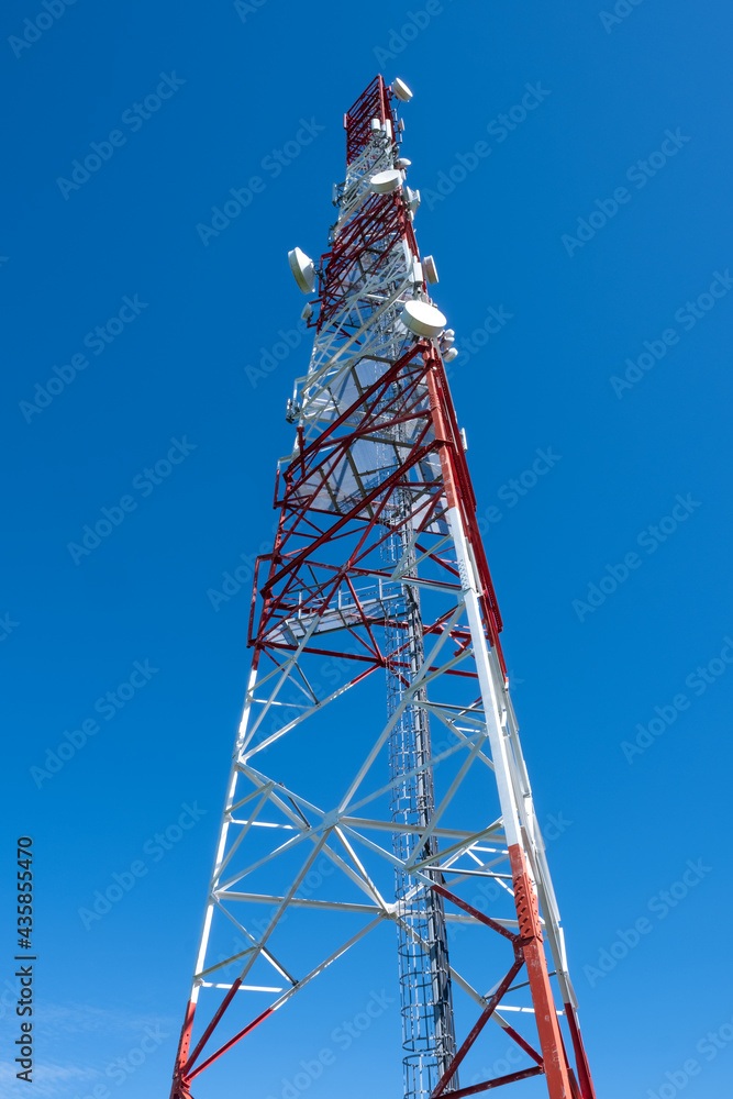 Telecommunication tower against blue sky Telecommunication tower against blue sky