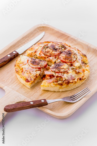 Mini pizza with sausage and cheese