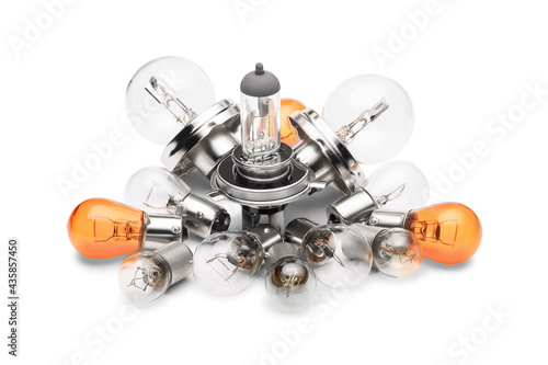 Pile of different car light bulbs isolated on white background, close up. photo