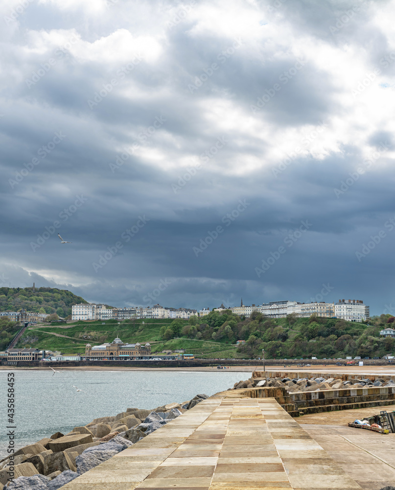 Seaside bay with heavy clouds.