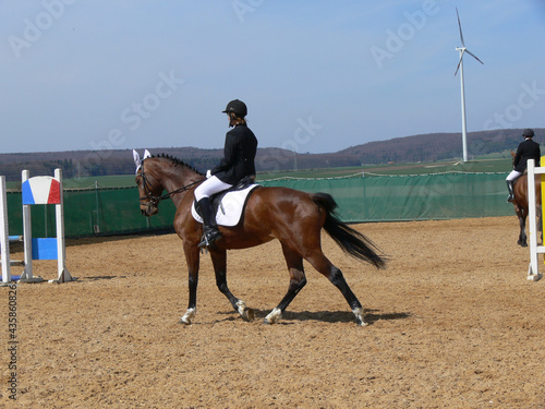 Rider on a show jumping tournament