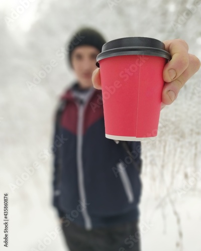 person with a cup