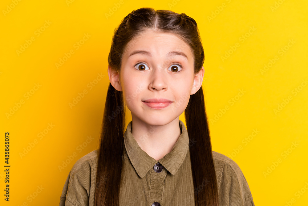 Fototapeta premium Photo portrait of small girl amazed surprised wearing casual outfit isolated on bright yellow color background