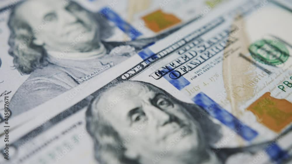 Macro shot of Benjamin Franklin's face on a U.S. one-hundred dollar bills Macro shot of Benjamin Franklin's face on a U.S. one-hundred dollar bills