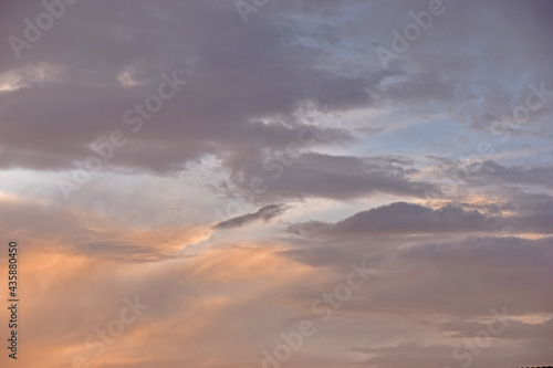 Evening sunset sky with clouds in summer