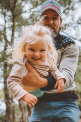 Child girl playing with father outdoor happy family smiling daughter and dad traveling together summer vacations lifestyle