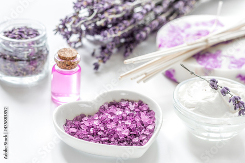 body cream with lavender herbs cosmetic white background