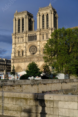 Paris, France - May the 24th 2021: A nice sunlight on the facade of Notre Dame de Paris.