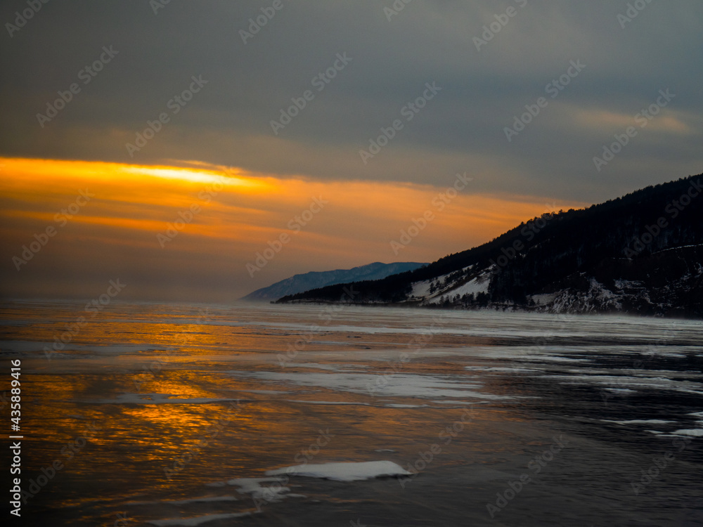 Beautiful sunset over the winter lake