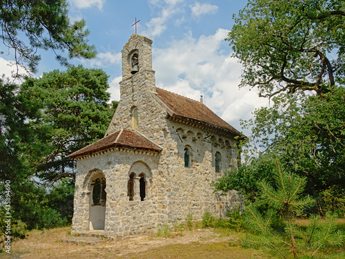 Little old roman chapel in the forest of Ermenonville, France