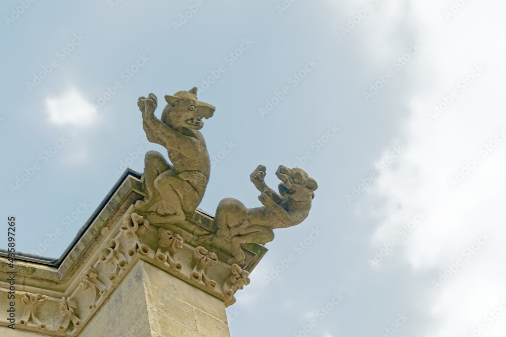 Fototapeta premium Grotesque gargoyles in fantasy animal shapes, detail of the chapel of the abbey of Chaalis, Oise, France