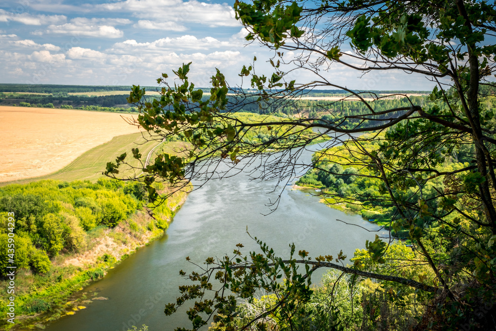 Summer landscape with beautiful river Don, high sand hills and forest. Krivoborie in Voronezh Region, Russia