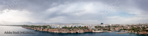 Panoramic photo of Antalya, Turkey. View from the sea to the Mediterranean coast and cityscape