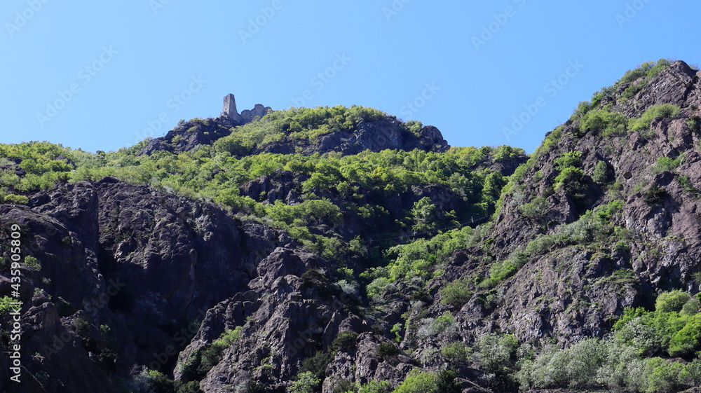 Ancient church dedicated to Saint Michael on top of a mountain in the North of Italy