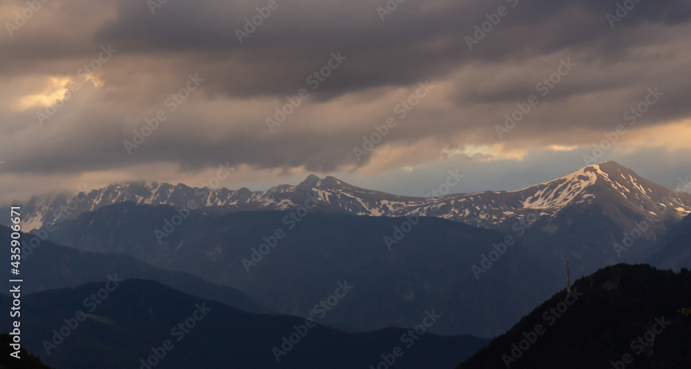 background of mountains and gray clouds during the afternoon background of mountains and gray clouds during the afternoon