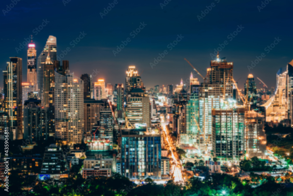 abstract blurred city lights and building with a circular bokeh on blue background.	
