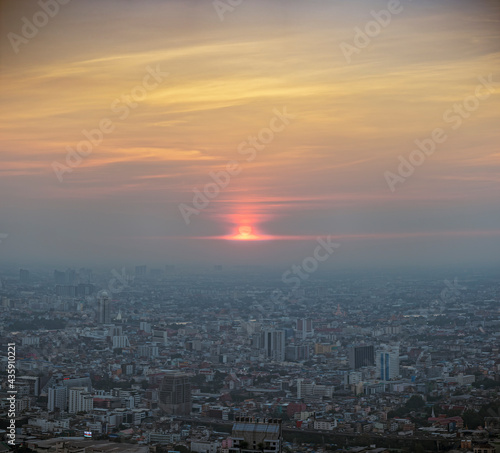 Bangkok city skyline at melacholic lonely misty sunset view from Baiyok ii Tower