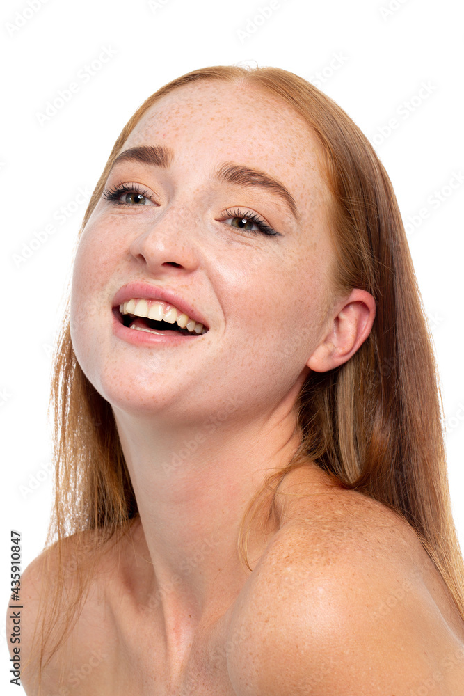 Obraz premium Young beautiful red hair model smiling