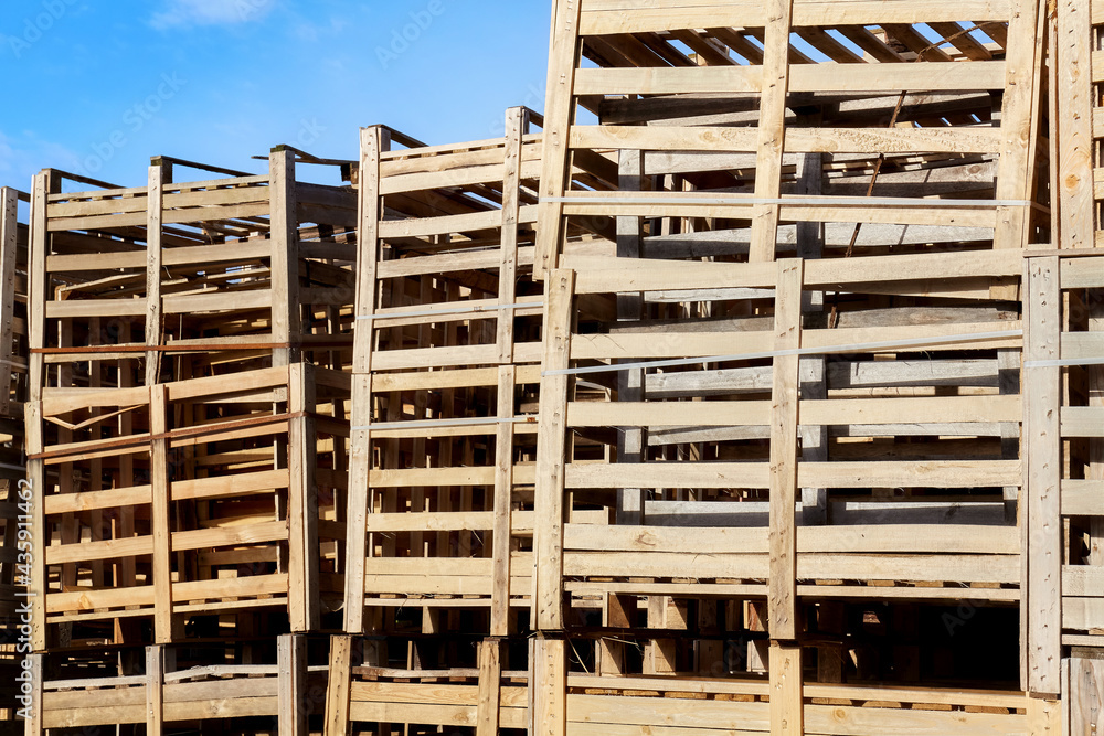 Pile of wooden containers for fruit and vegetable transportation.